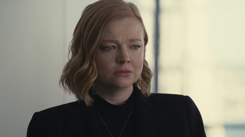 Sarah Snook as Shiv Roy, holding back tears in the Waystar boardroom on Succession