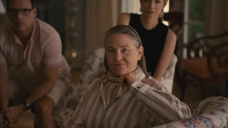 Cherry Jones as Nan Pierce, sitting in her drawing room with two members of her family on Succession