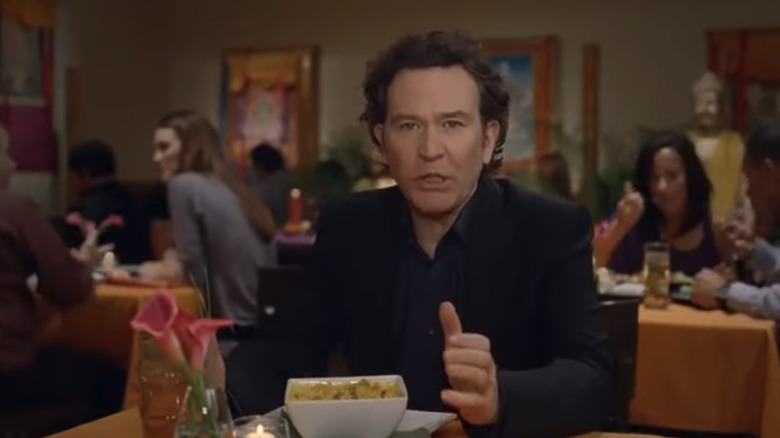 Timothy Hutton sits down for a meal at a Himalayan restaurant.