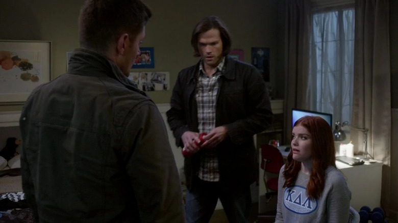 Sam (Jared Padalecki) and Dean (Jensen Ackles) interrogating a student on "Supernatural."