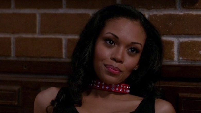 Portia (Mishael Morgan) sitting down on "Supernatural."