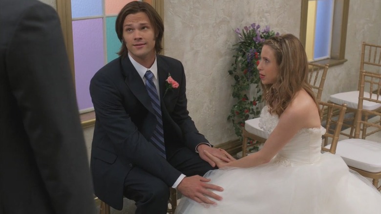 Sam (Jared Padalecki) and Becky (Emily Perkins) wearing wedding attire on "Supernatural."