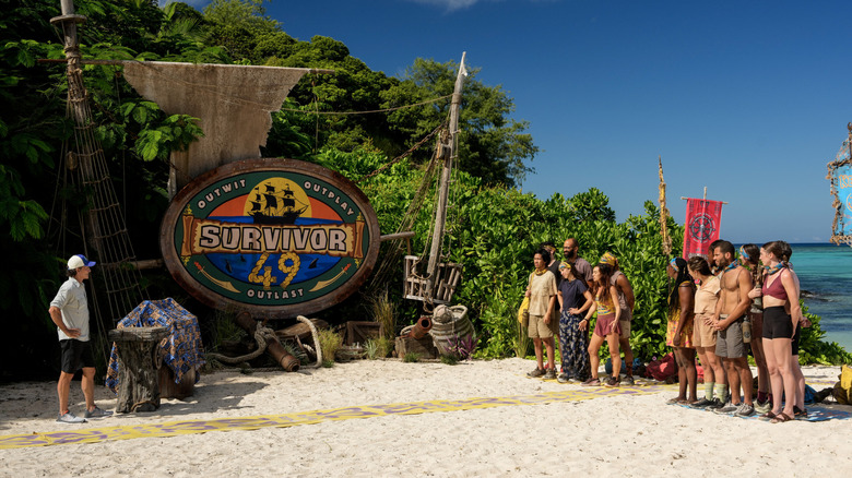 The cast of Survivor 49 meet with host Jeff Probst