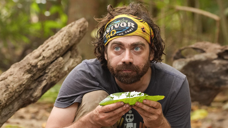 Christian Hubicki enjoys some rice on Survivor 50