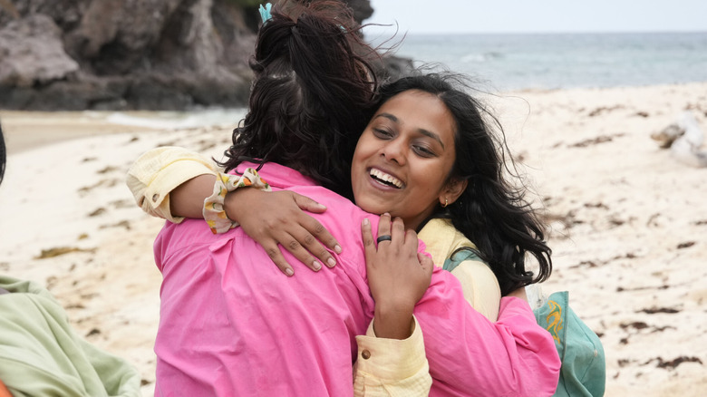 Kamilla Karthigesu hugs Genevieve Mushaluk