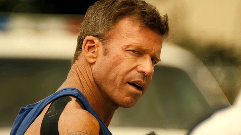 Cody Spears (Taylor Sheridan) looking at someone on "Lioness"