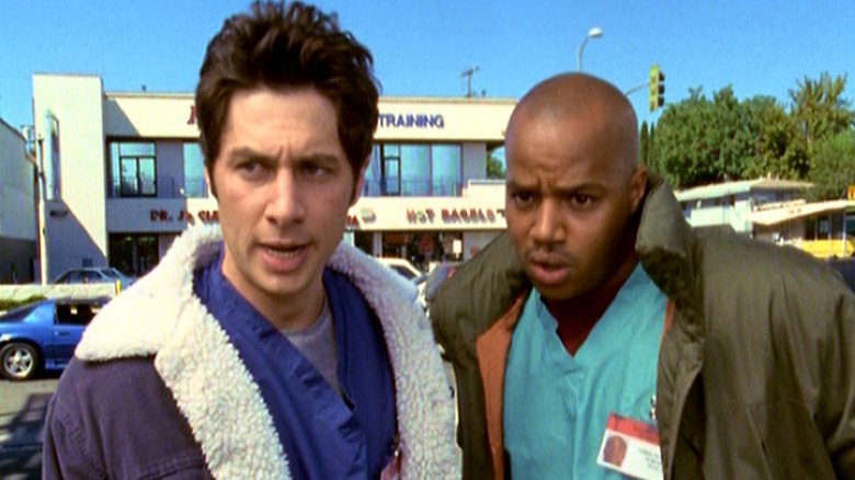 Zack Braff as J.D. and Donald Faison as Christopher, deciding on a course of action in Scrubs