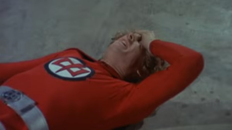 William Katt as Ralph knocked down and holding his head on The Greatest American Hero.