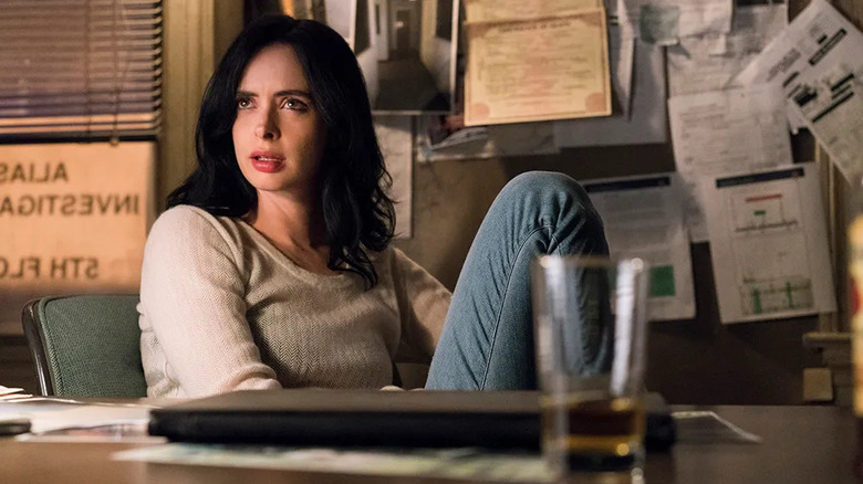 Krysten Ritter as Jessica Jones is almost finished with her drink