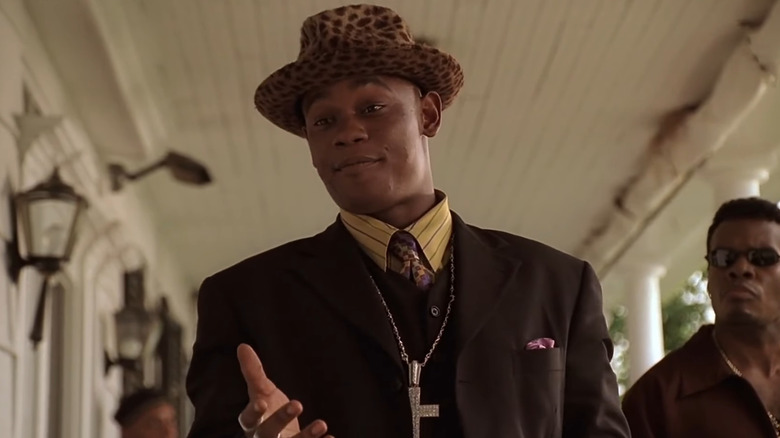 Bokeem Woodbine as Massive Genius, smiling and extending his hand on The Sopranos