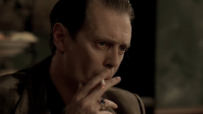 Steve Buscemi as Tony Blundetto, smoking a cigarette on The Sopranos