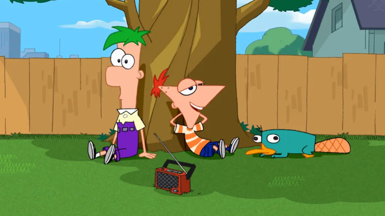 Phineas, Ferb, and Perry lying under a tree in Phineas and Ferb