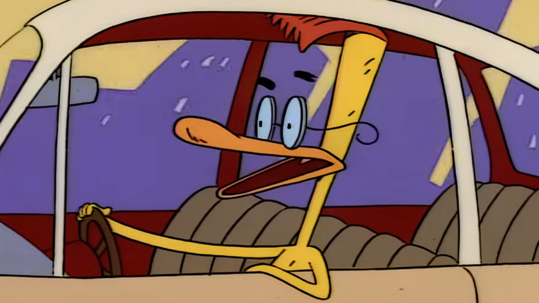 Duckman driving a car