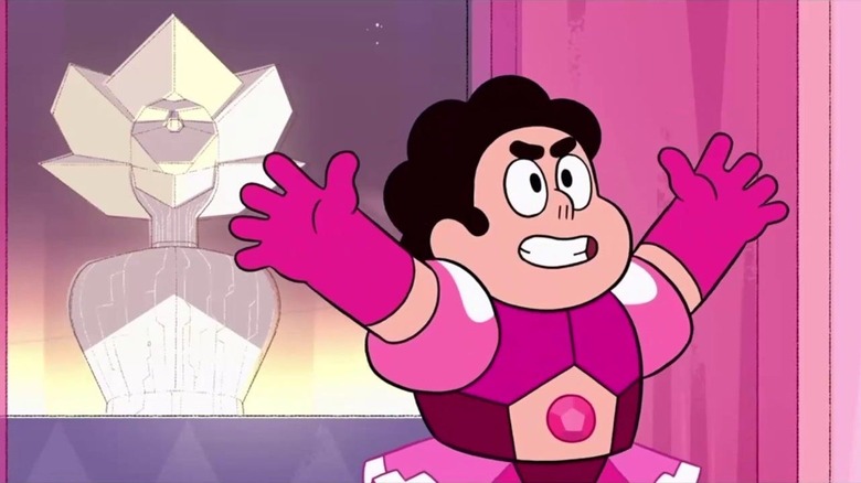 Steven Universe (Zach Callison) outstretches his armors while wearing a pink crystalline armor in Steven Universe