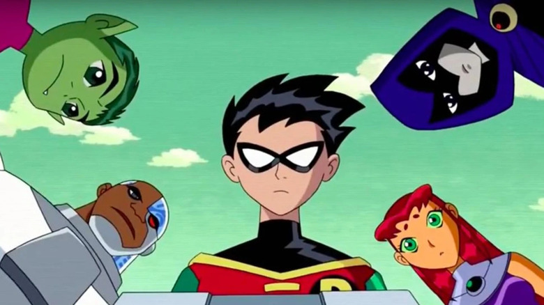 The Teen Titans look down at the camera in Teen Titans