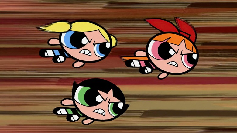 Blossom (Cathy Cavadini), Bubbles (Tara Strong), and Buttercup (E.G. Daily) fly into action in The Powerpuff Girls