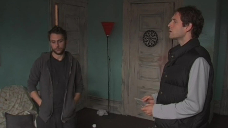 Charlie Day and Glenn Howerton as Charlie and Dennis in Charlie's apartment on Always Sunny