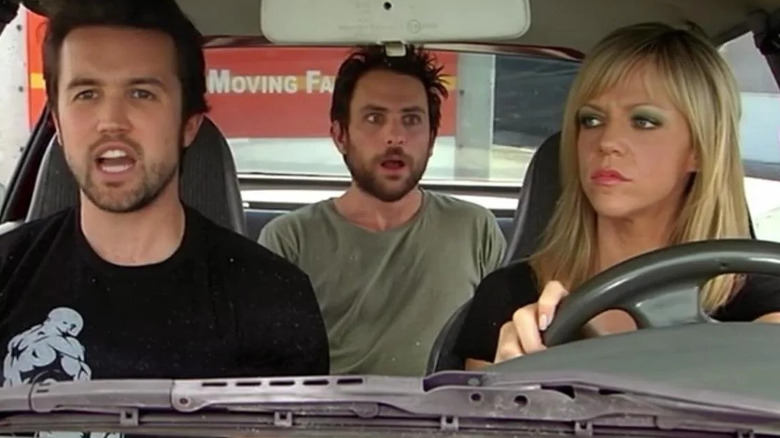 Rob Mac, Charlie Day, and Kaitlin Olson as Mac, Charlie, and Dee in a car on Always Sunny