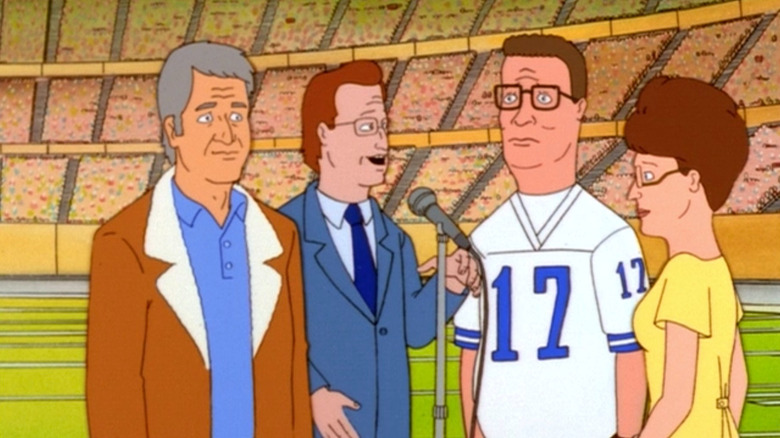 Hank and Peggy at a football game on King of the Hill