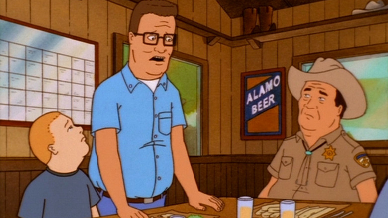 Hank talking to a sheriff on King of the Hill