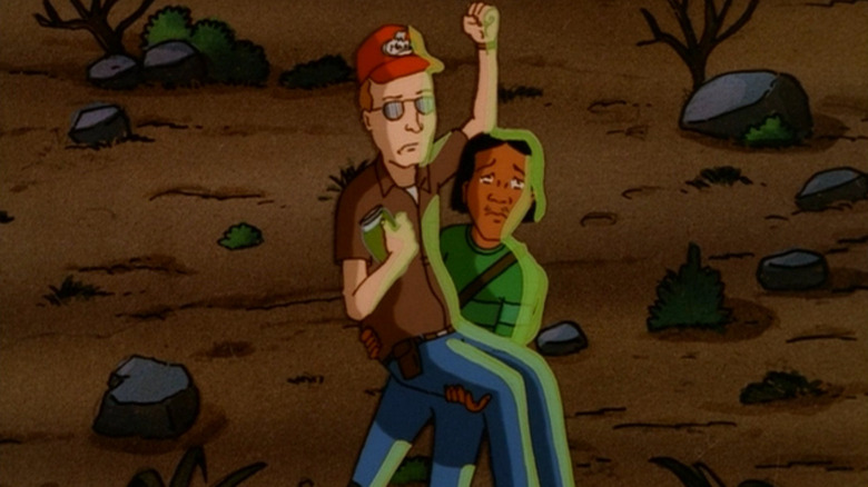 Joseph holding Dale on King of the Hill