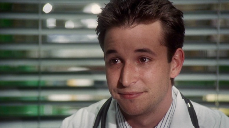Dr. John Carter smiling