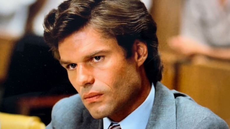 Michael Kuzak looking on