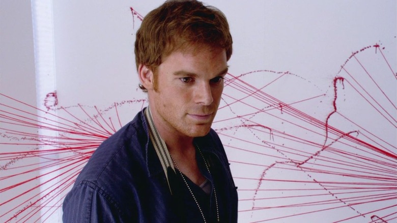 Michael C. Hall with artful blood splatter behind him as Dexter on Dexter