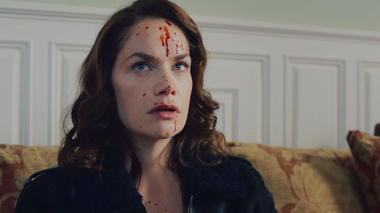 Ruth Wilson with blood splattered on her face as Alice Morgan on Luther