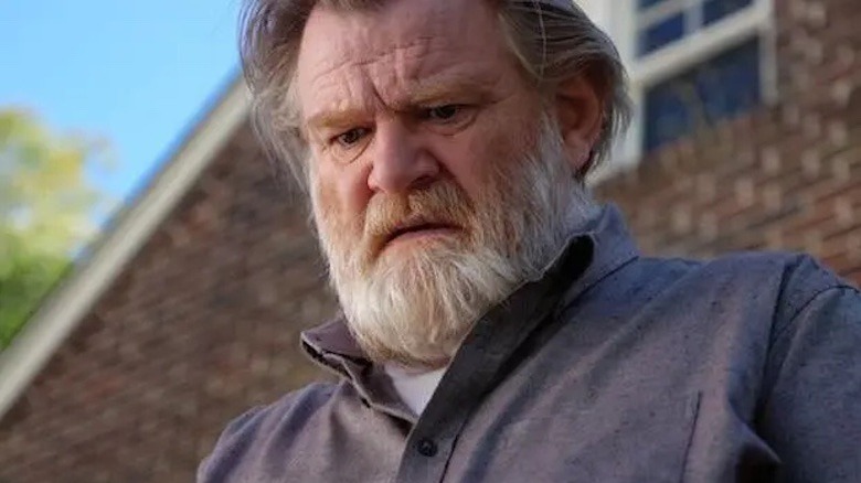 Brendan Gleeson looking down in horror as Bill Hodges on Mr. Mercedes