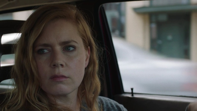 Amy Adams sitting in car close-up as Camille Preaker on Sharp Objects