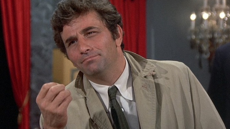 Frank Columbo (Peter Falk) holds out his hand in Columbo