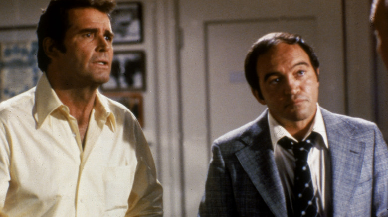 Jim Rockford (James Garner) and Dennis Becker (Joe Santos) standing together in The Rockford Files