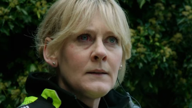 Sarah Lancashire as Catherine Cawood, staring out with a bloody eye in Happy Valley