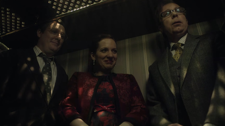 Three partygoers hide together in a closet in Inside No. 9