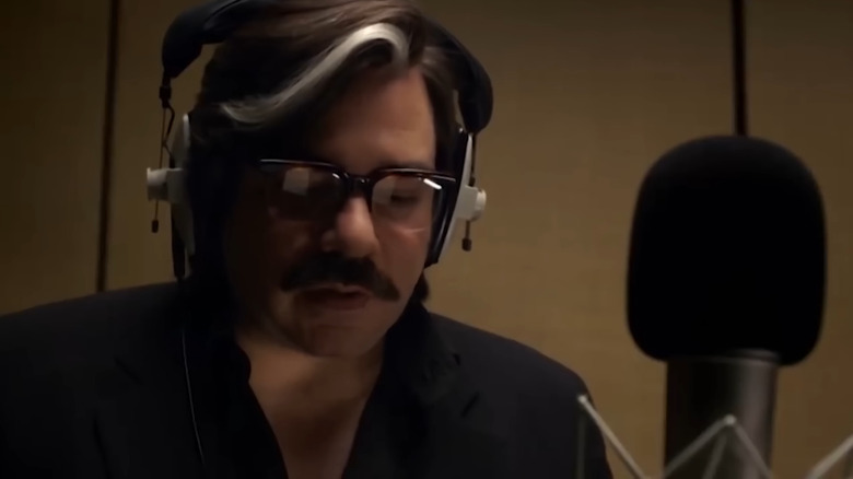 Matt Berry as Steven Toast, recording lines in a microphone on Toast of London