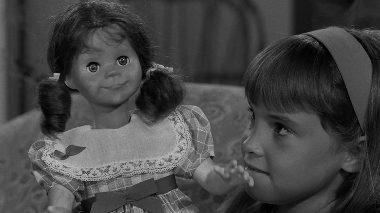 Tracy Stratford as Christie, with the terrifying Talky Tina doll, in The Twilight Zone episode Living Doll.