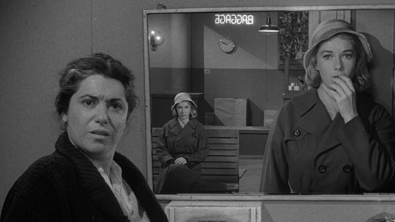 Millicent (Vera Miles) sees her doppelganger in the mirror, confusing the attendant (Naomi Stevens) in The Twilight Zone episode Mirror Image