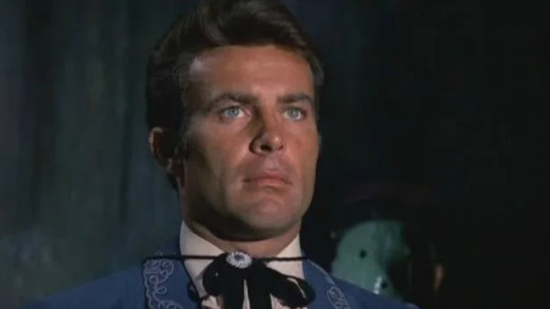 James West (Robert Conrad) looks up pensively in The Wild Wild West