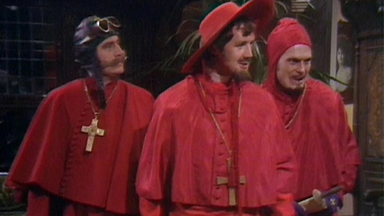 Terry Jones, Michael Palin, and Terry Gilliam as the never-expected Spanish Inquisition, on Monty Python's Flying Circus.