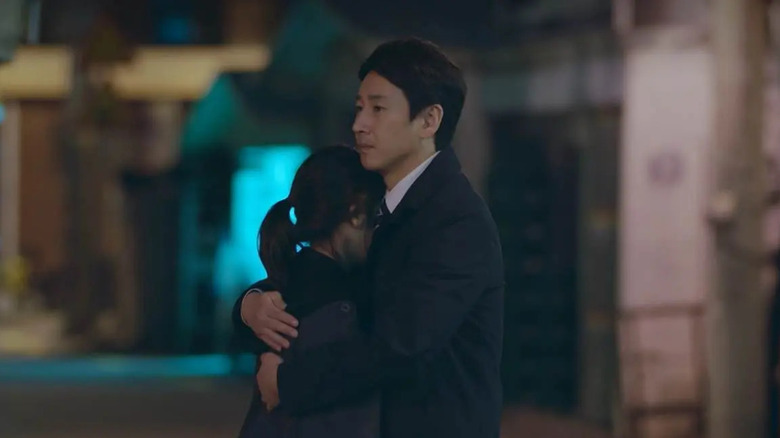 Park Dong-hoon hugging Lee Ji-an in a deserted nighttime street in My Mister
