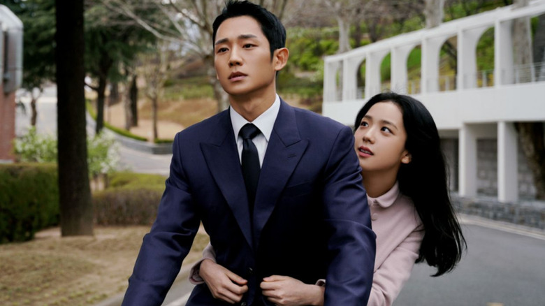 Lim Soo-ho solemnly rides a bicycle with Eun Yeong-ro clinging to him in Snowdrop