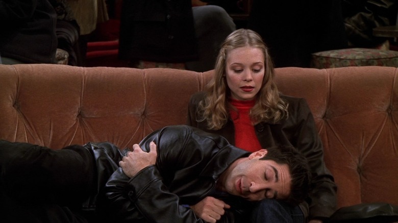 David Schwimmer as Ross, laying on Elizabeth's (Alexandra Holden) lap on Friends