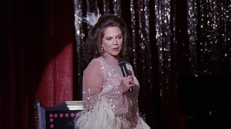 Kathleen Turner as Helena Handbasket, performing on stage on Friends