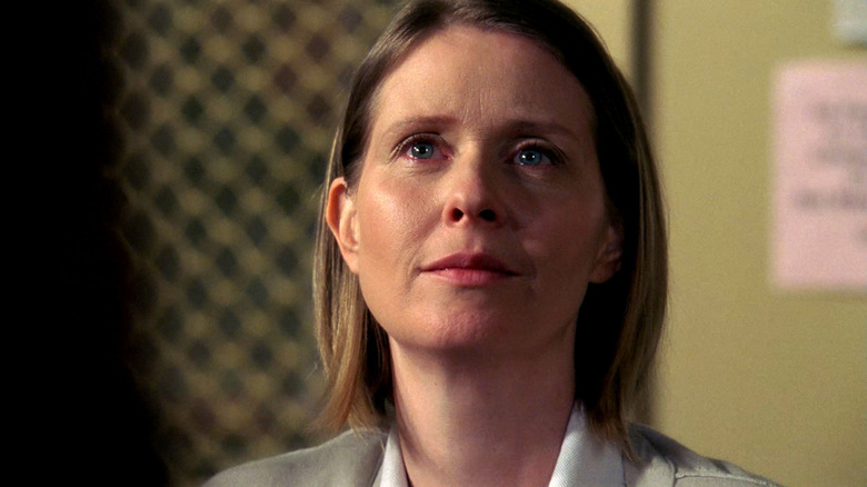 Janis (Cynthia Nixon) looking up at someone in an interrogation room on Law & Order: Special Victims Unit