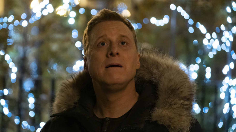Harry Vanderspiegle (Alan Tudyk) looks up in amazement in Resident Alien