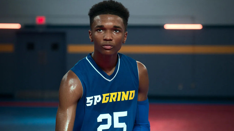 A sweaty Jace Carson (Isaiah Hill) looks up on a basketball court in Swagger