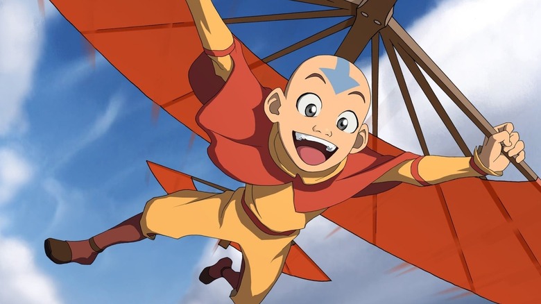 Aang flies using his glider in Avatar: The Last Airbender