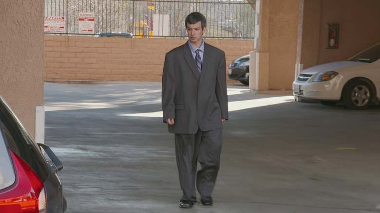 Nathan Fielder as himself, wearing a large suit on Nathan For You