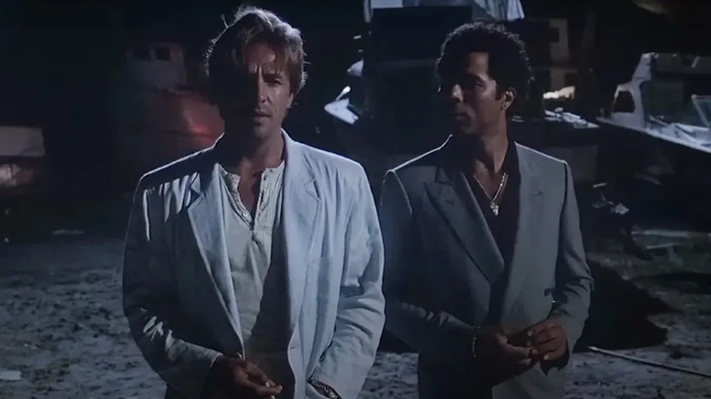 Sonny Crockett (Don Johnson) and Ricardo Tubbs (Philip Michael Thomas) standing next to each other on "Miami Vice"